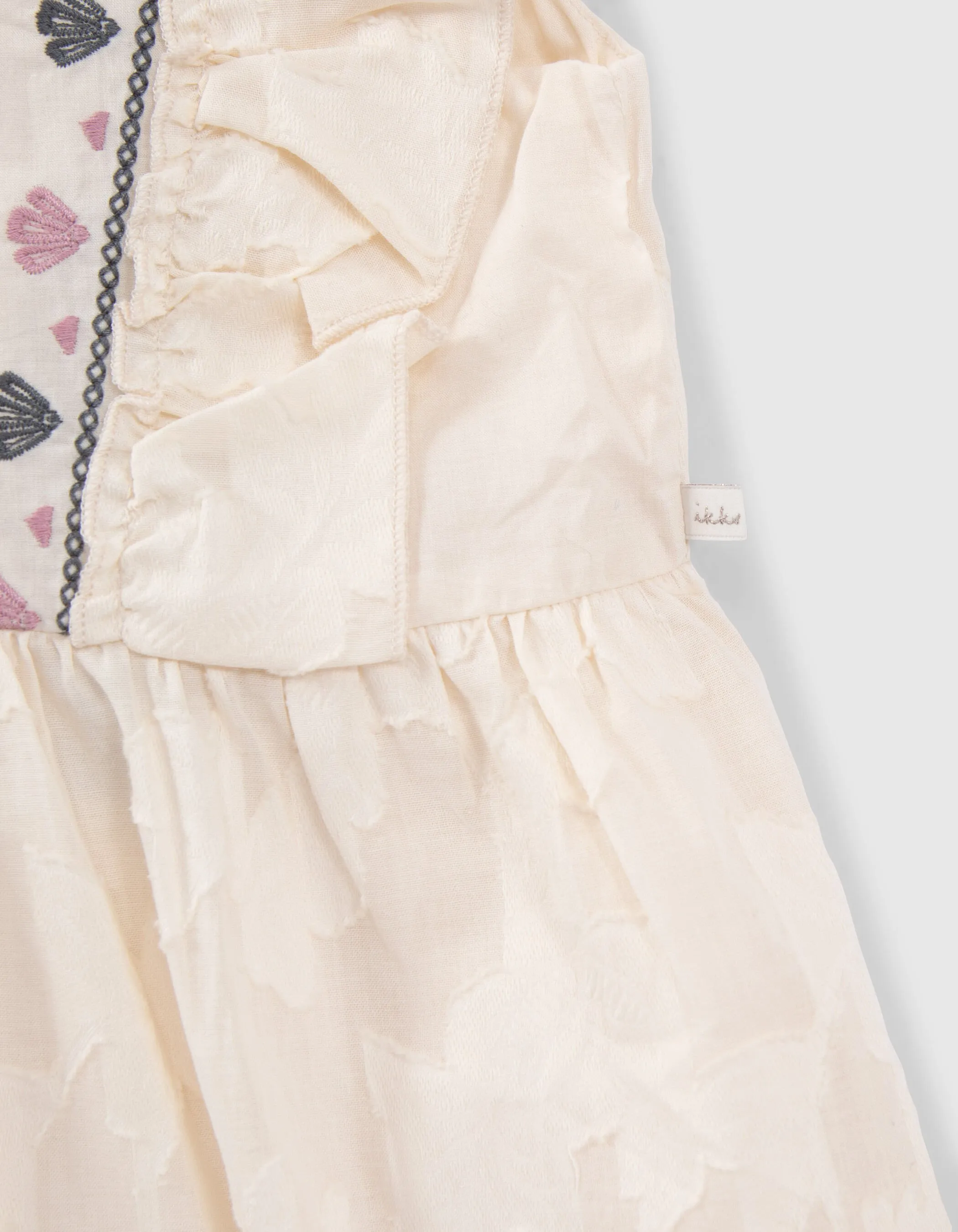 Robe écrue jacquard fleurs et broderies fille